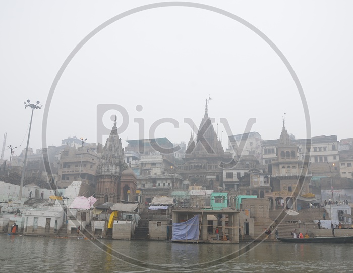 Ghats in Varanasi With Hindu Temples And Boats