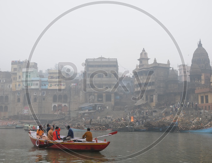 Pilgrims Taking Morning Boat Rides on River Ganga in Varanasi