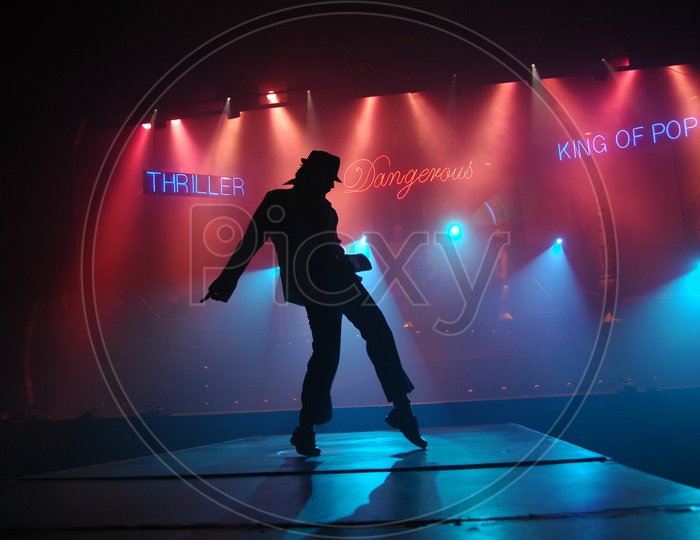 Silhouette Of Man Dancing Michale Jackson Style On Stage In Movie Working Stills