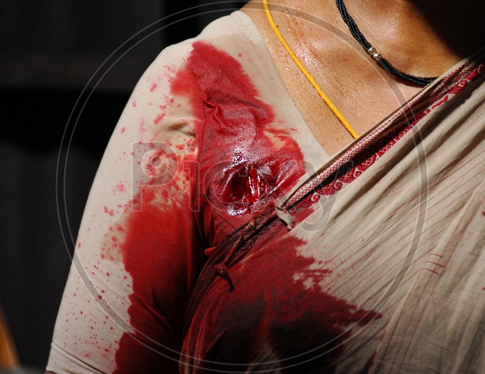 Dummy Bullet Wound on Woman Shoulder, Telugu Movie Working stills