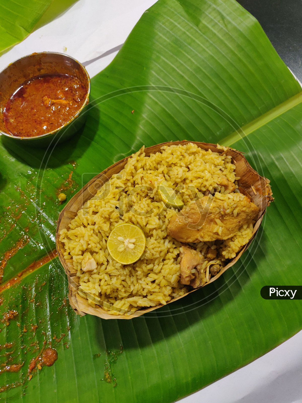 Karnataka Style Chicken  Donne  Biryani  Served In Banana Leaf At Vidyarthi Bhavan