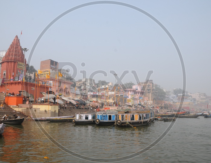 Hindu Temples And Boats In the Ghats of Varanasi