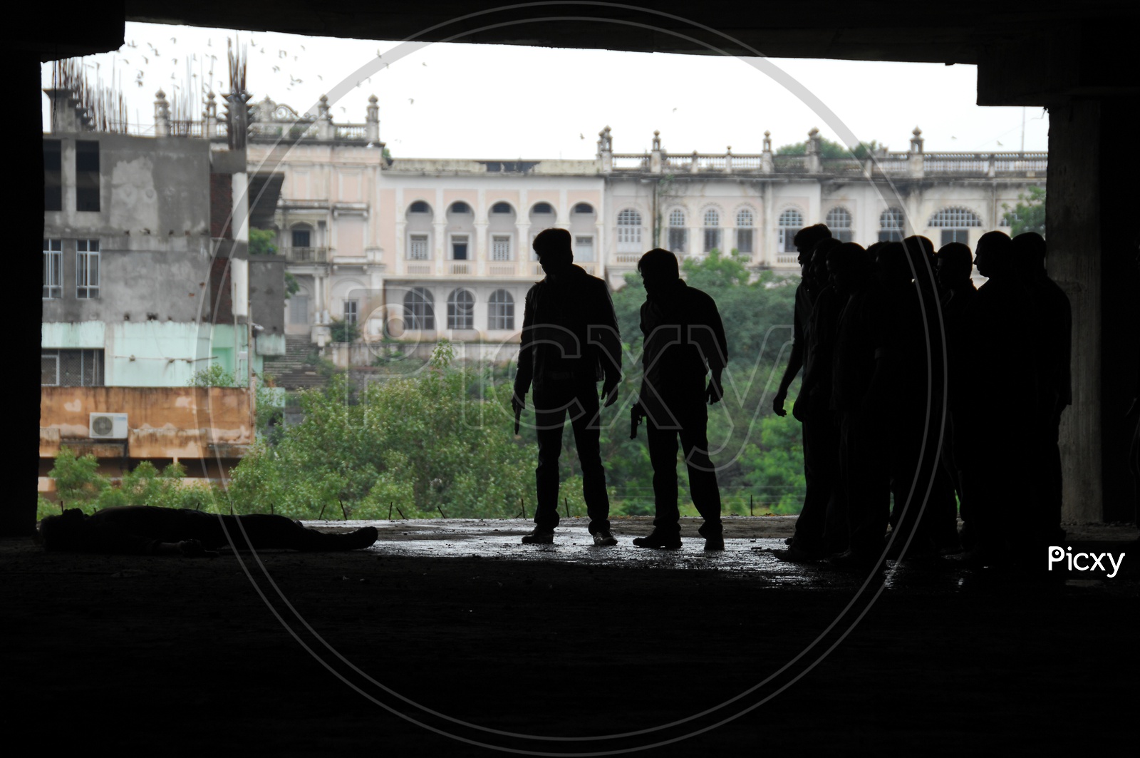 Silhouette Of Group Of People in an Under Construction Building in Movie Working Stills