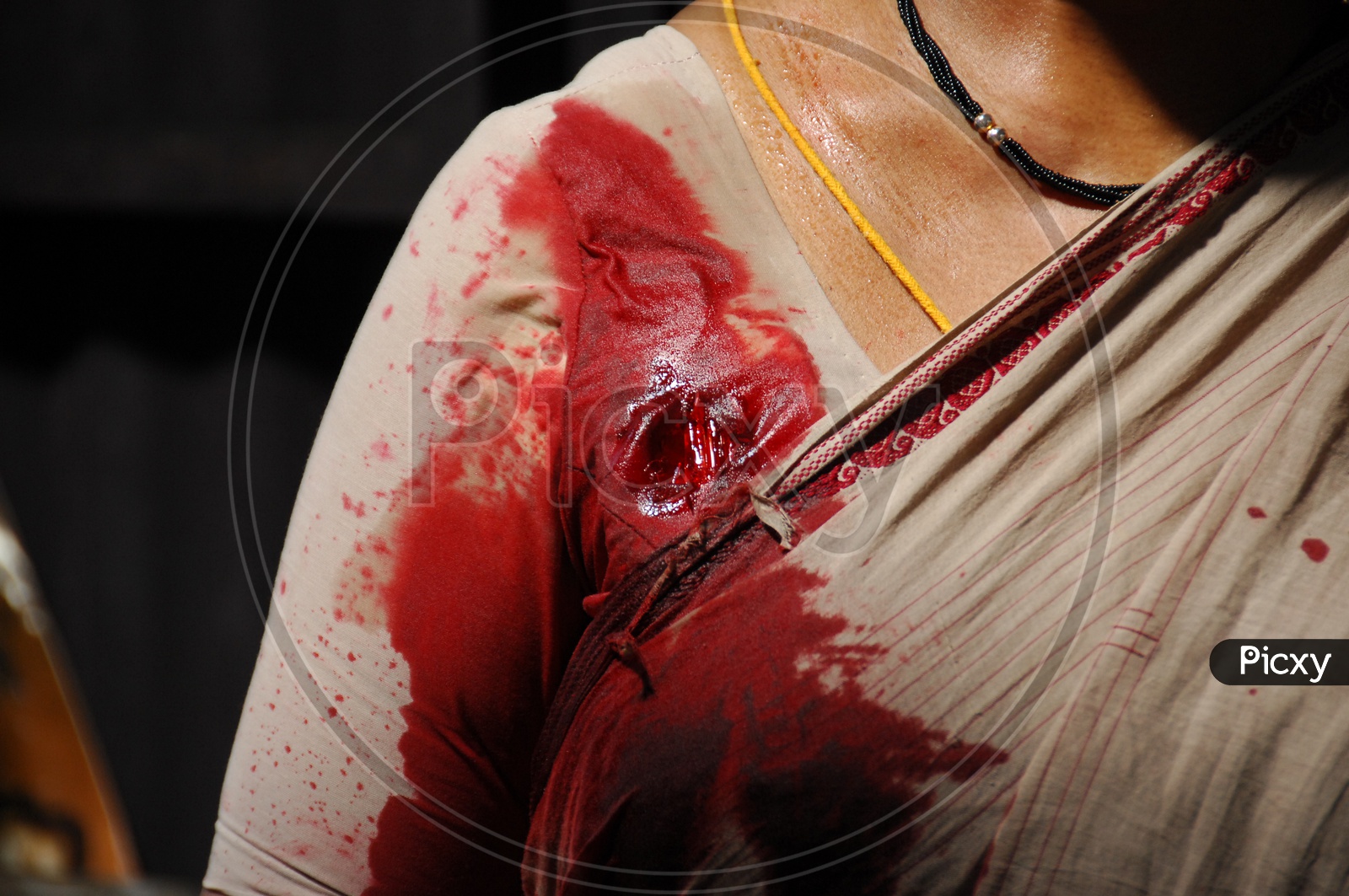 Dummy Bullet Wound on Woman Shoulder, Telugu Movie Working stills