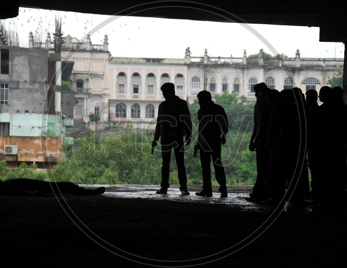 Silhouette Of Group Of People in an Under Construction Building in Movie Working Stills