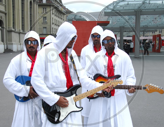Dancers As a Group Dancing on Streets of Swiss in a Movie Song Shoot