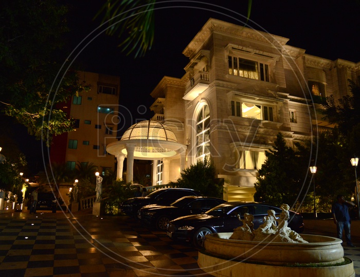 Luxury Cars Parked in an House Compound With Night Lights