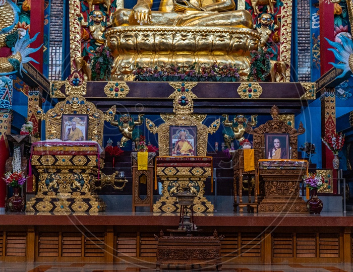 Golden Buddha Statues In Buddhist Golden Temple At Namdroling Monastery in Bylakuppe, Karnataka