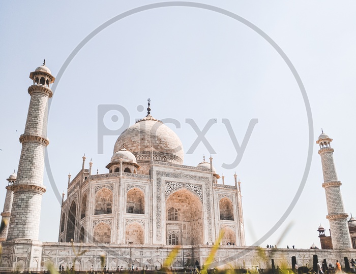 An immense mausoleum of White marble. Taj Mahal.