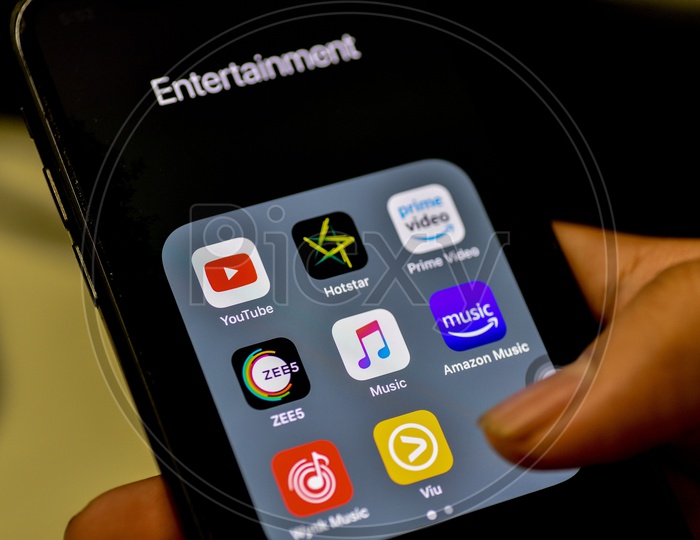 Entertainment Online Streaming Apps Installed Icons  On a Smartphone Screen Closeup With Selective Focus