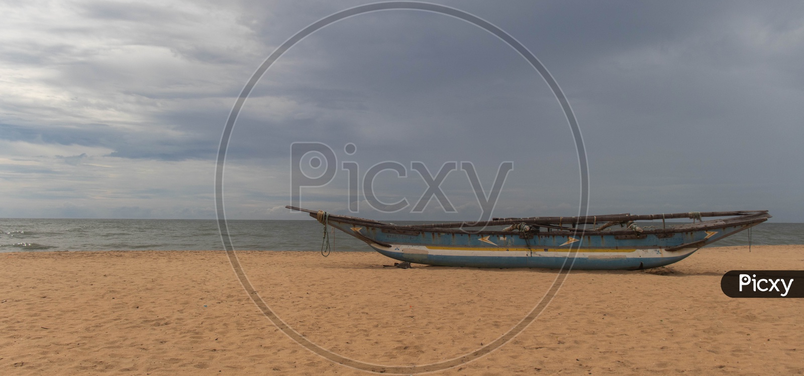 Lone Fishing Boat In a Beach