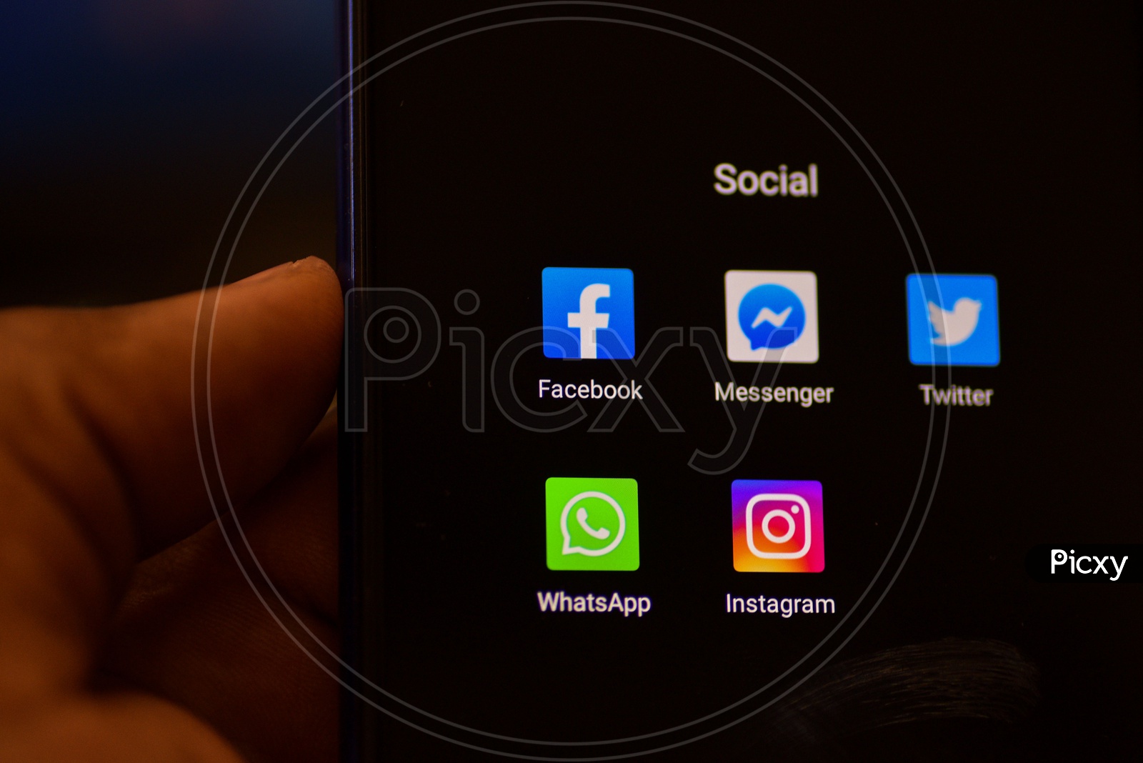 Social Networking Apps Installed Icons On a Smartphone Screen Closeup With Selective Focus on Facebook