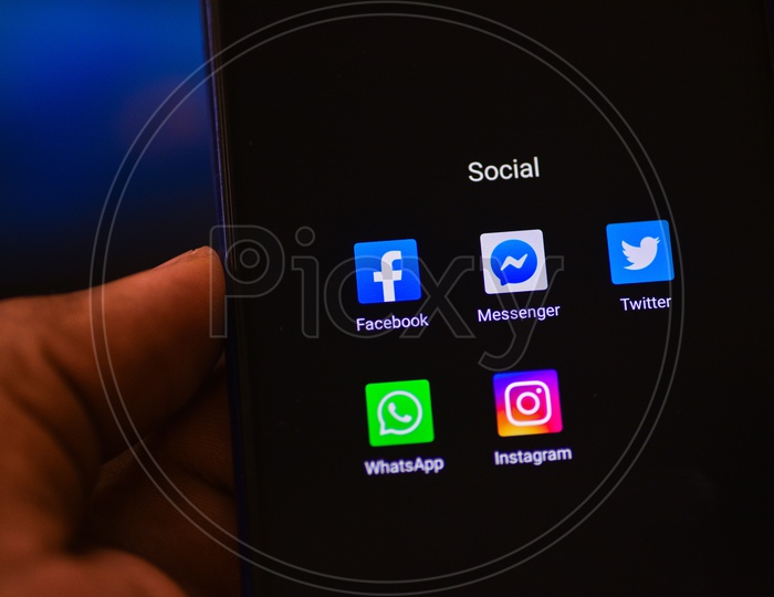 Social Networking Apps Installed Icons On a Smartphone Screen Closeup With Selective Focus on Twitter