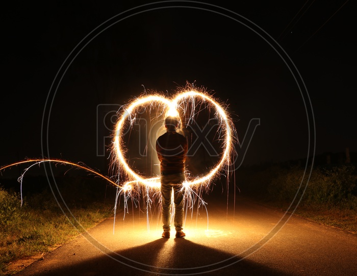 Firewool Photography With a Man Making Circles