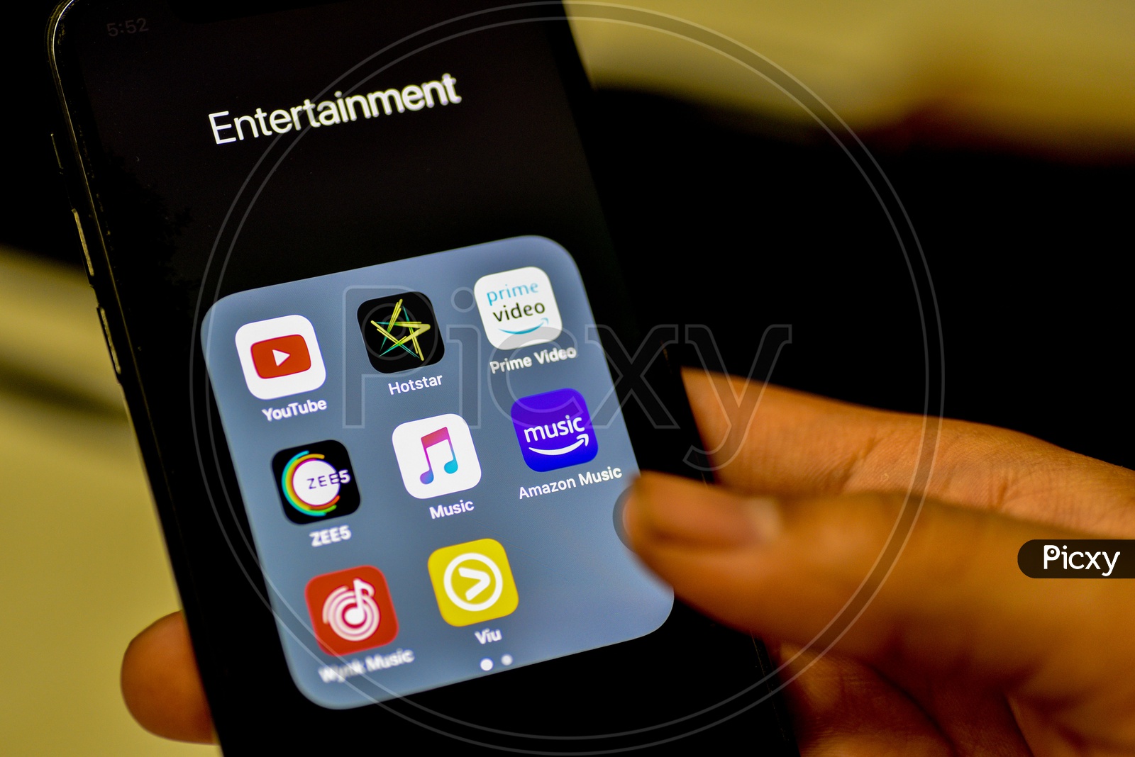 Entertainment Online Streaming Apps Installed Icons  On a Smartphone Screen Closeup With Selective Focus