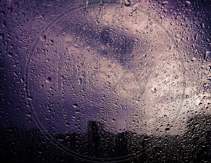 Rain Droplets On a Window Glass Shield