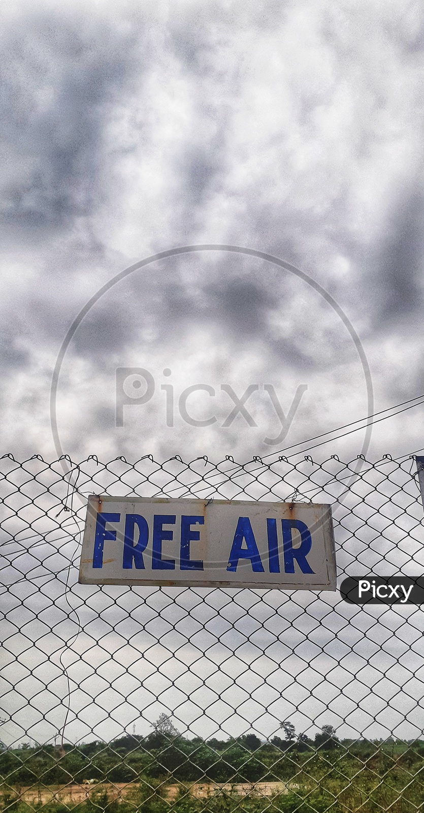 Free Air Name Board  Tagged To a Compound Fence