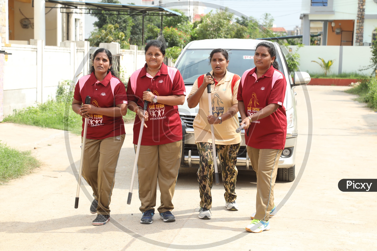 Image Of She Team Police Woman With Lathi In Hands-CM605789-Picxy