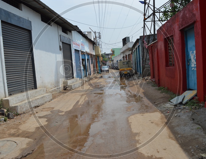 Mud Roads With Water Pits In an Residential Area