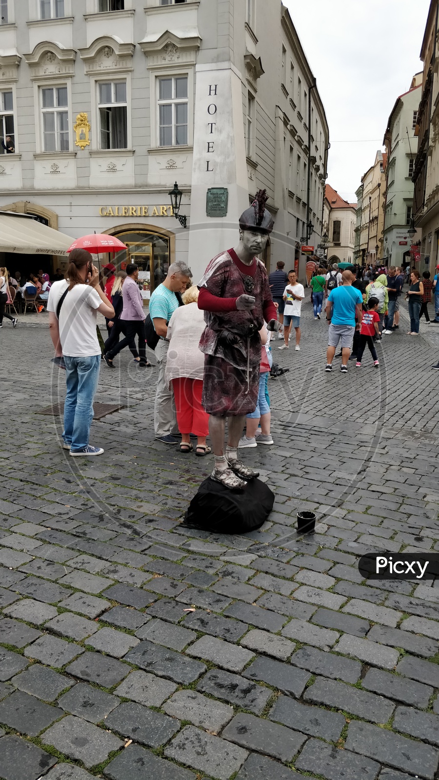 Streets Of Prague City With Tourists And Street Artists