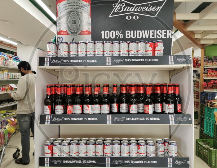 Budweiser Beer Bottles and Tins in a Store