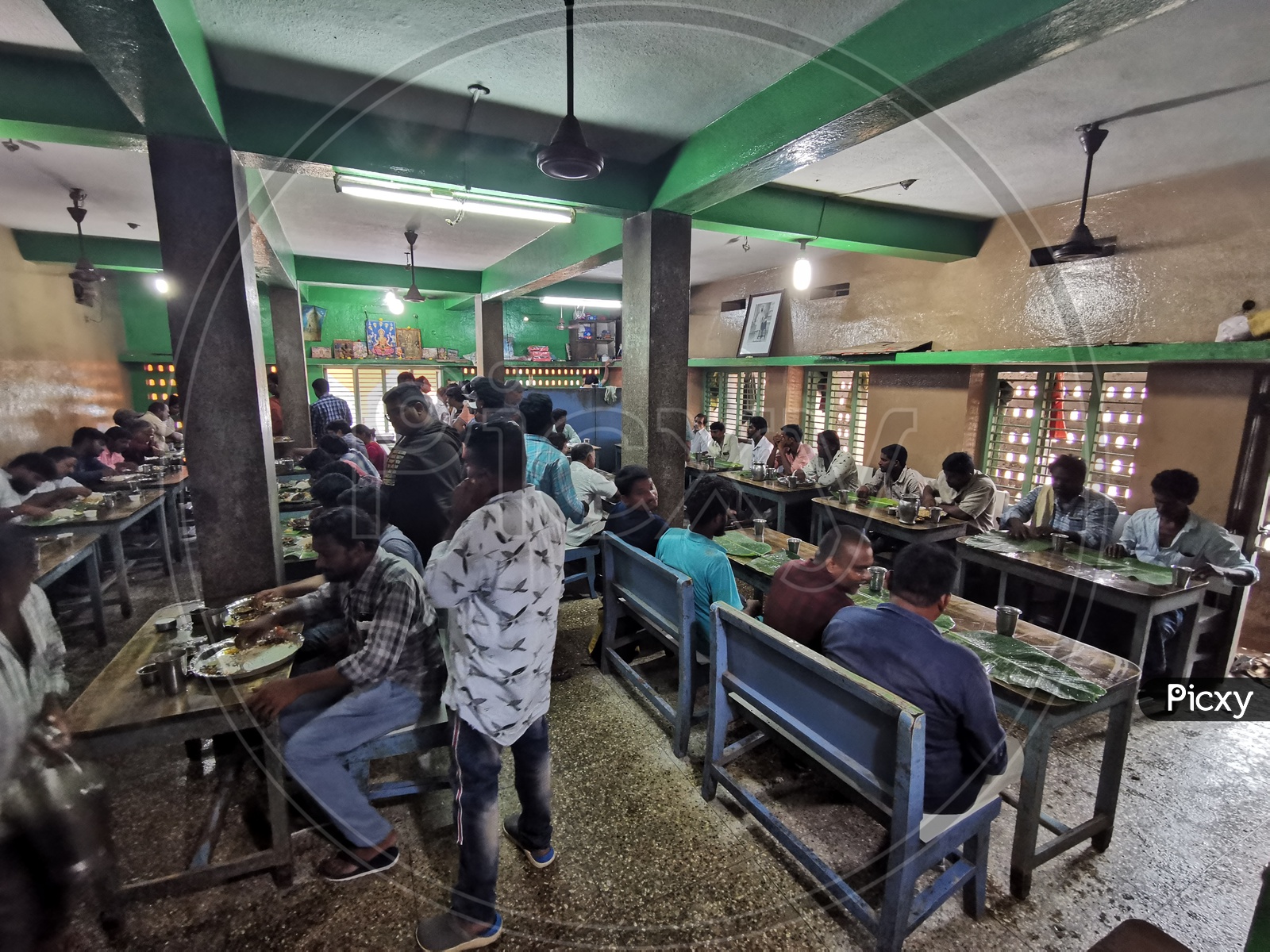 Foodies Or Customers Eating Food in an Old Hotel in Eluru