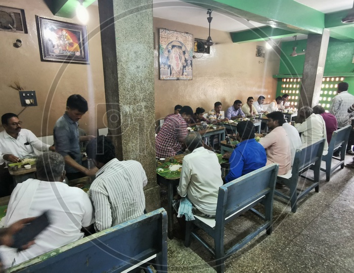 Foodies Or Customers Eating Food in an Old Hotel in Eluru