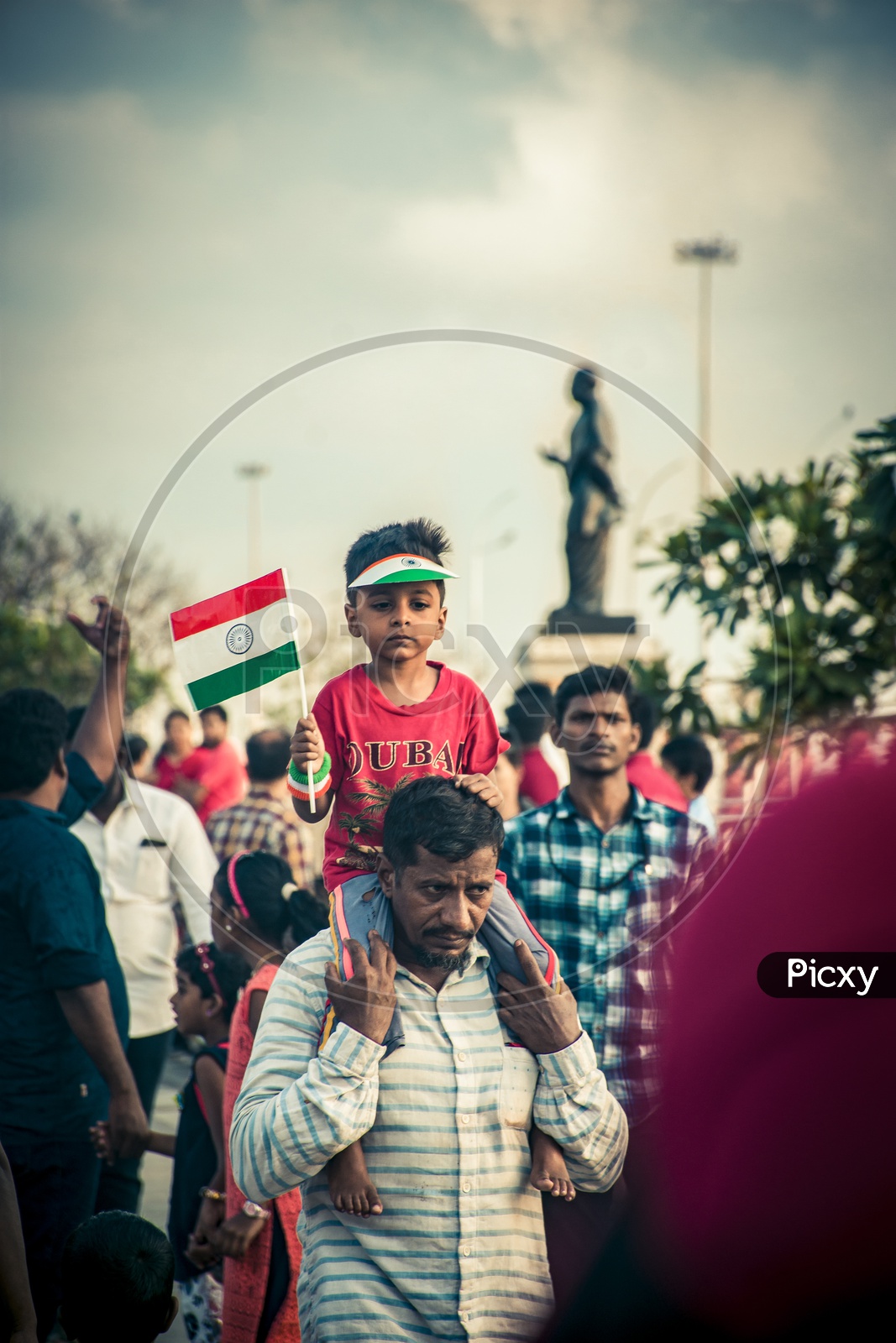 Indian Boy With Tricolor India National Flag in Hand