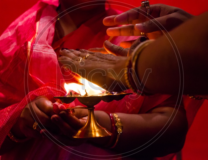 Hands Taking Flame Heat, A Ritual Of Blessings In Hindu God Worship