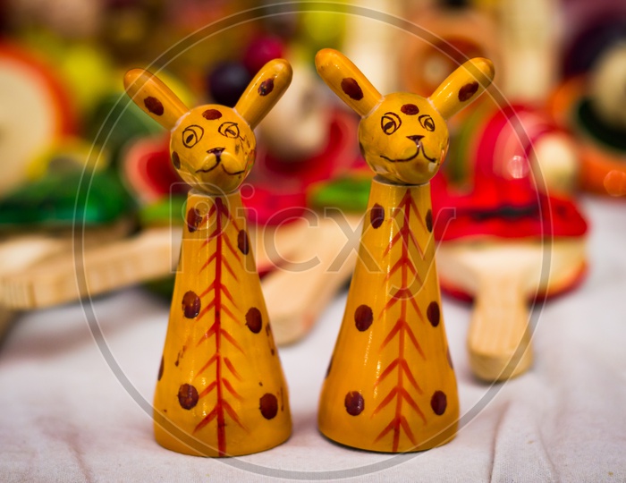Two Yellow Wooden Giraffe Figure Vintage Toy