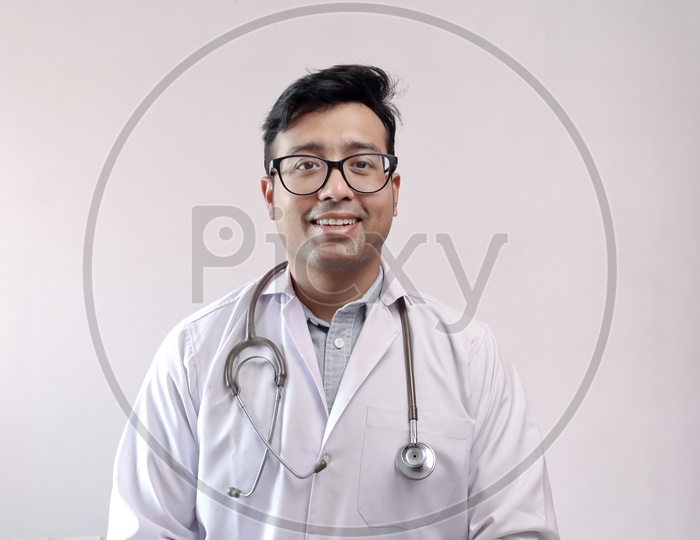 Male Indian Doctor In White Coat And Stethoscope