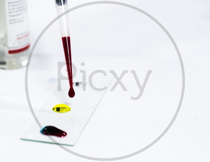 Drop Of Blood On Glass Slide For Blood Grouping Using Micro Tip