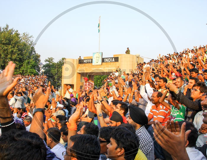 August 15,2018, Wagha Border, Amritsar, India. Indian Crowd Cheering And Celebrating Indian Independance Day Event Performed By Border Security Force Of Indian Army At Wagha Border, India.