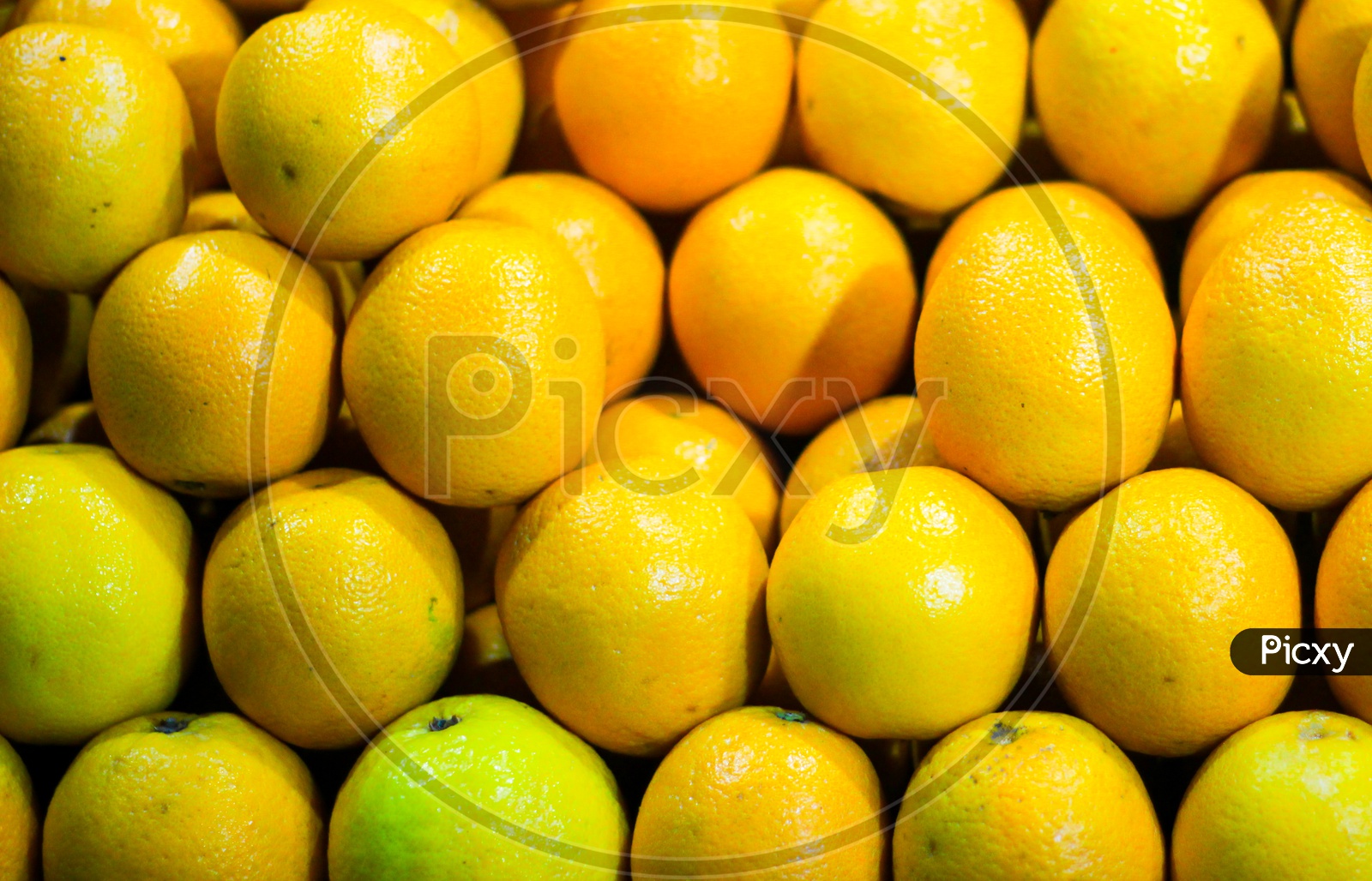 Heap Of Ripe Yellow Sweet Lime For Sale In Market