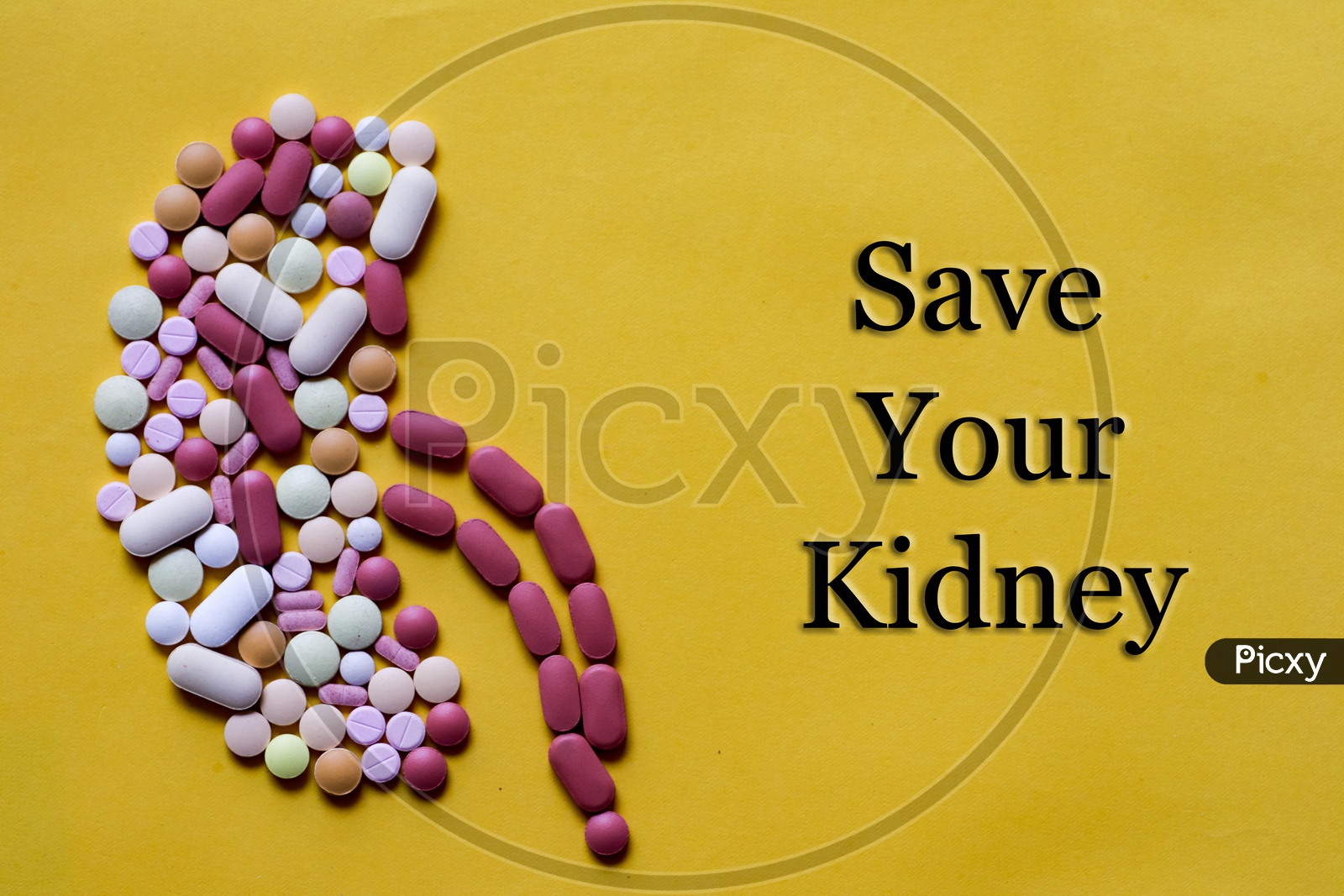 Medicine Pills Tablets Capsules In Shape Of Human Kidney In Yellow Background With Space For Text