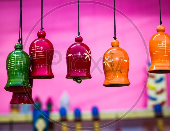 Colorful Wooden Bells Hanging By String. Musical Instrument