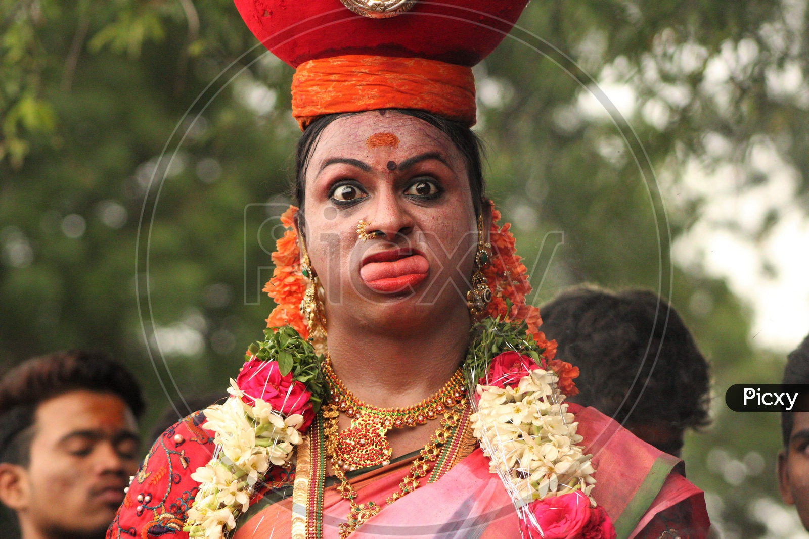 Telangana Woman Carrying Bonam On Her Head And With an Expression on Face