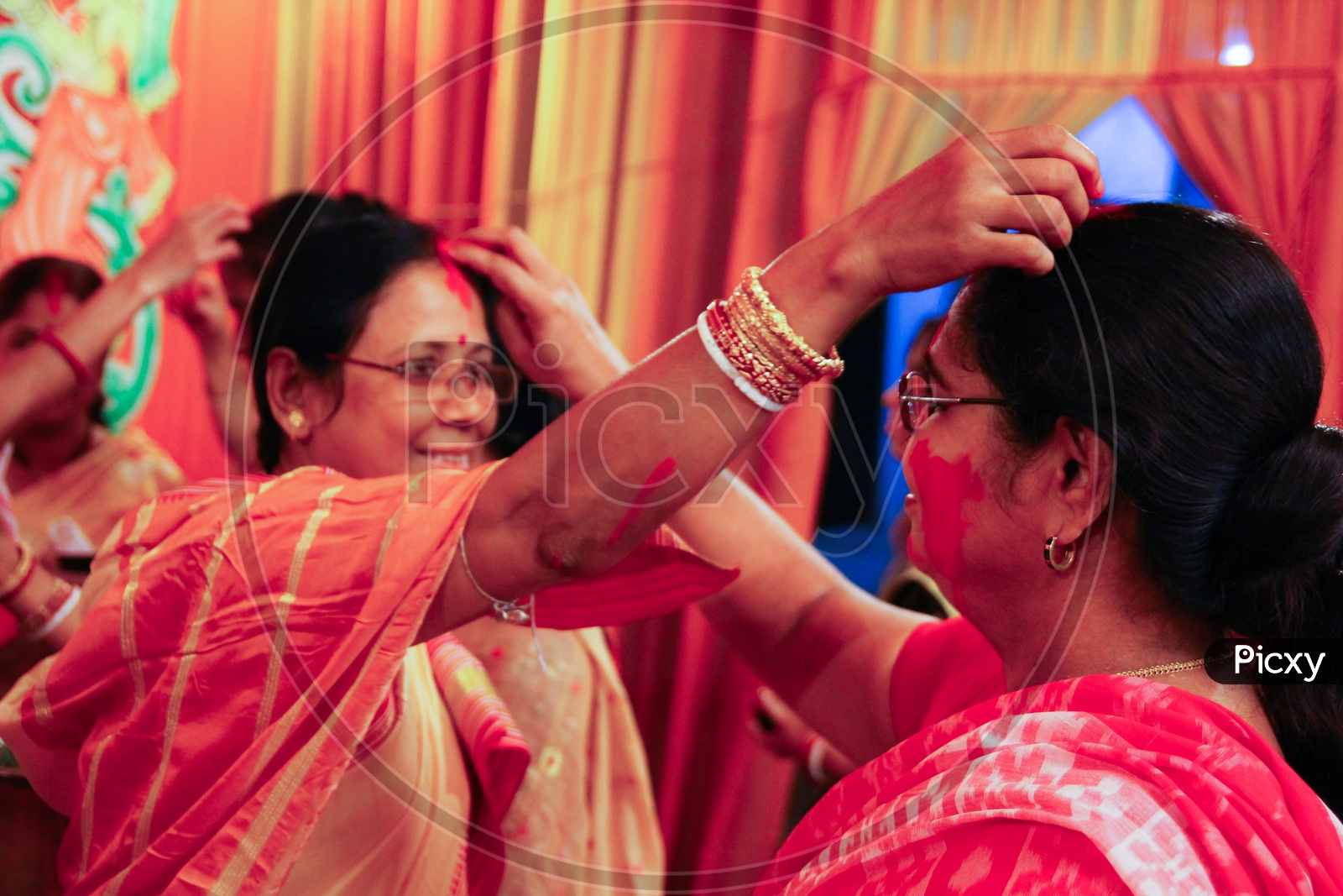 October, 2018, Kolkata, India. Bengali Wives Playing With Sindur On The Occasion Of Maha Vijaya Dashami, A Common Hindu Ritual
