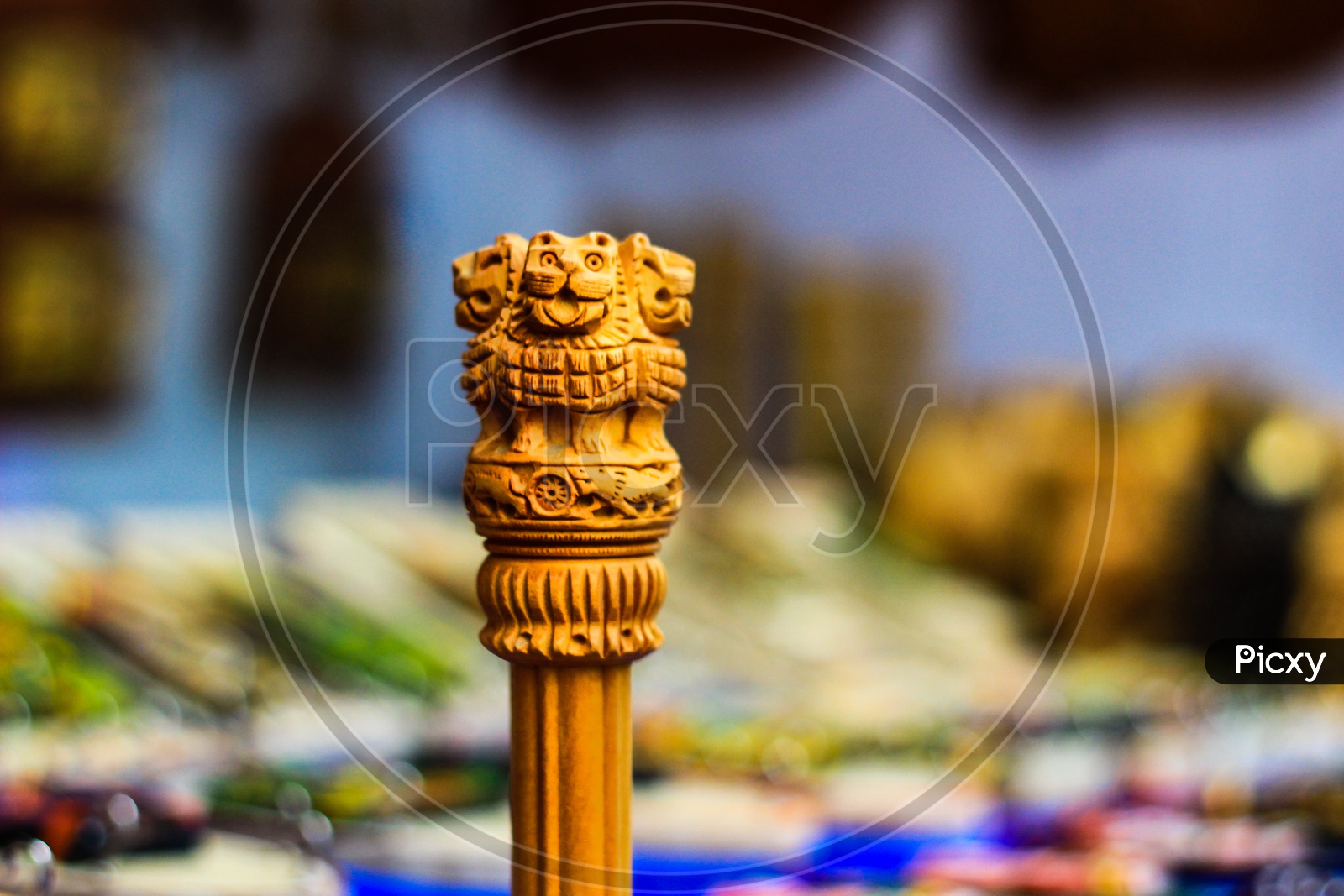 Miniature Wooden Replica Of Ashoka Stambha. An Ancient Historic Indian Monument.Lion Face Pillar Of Ashoka, Indian National Emblem.
