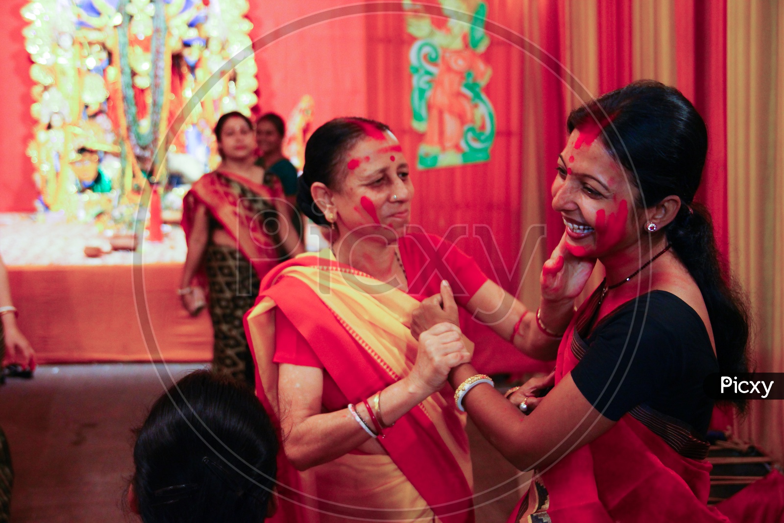 October, 2018, Kolkata, India. Bengali Wives Playing With Sindur On The Occasion Of Maha Vijaya Dashami, A Common Hindu Ritual