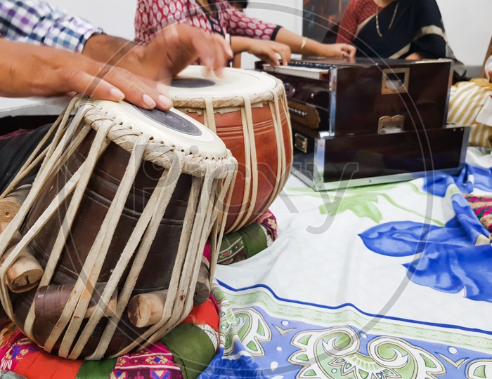 Close Up Image Of Musician Hand Playing Tabla, An Indian Classical Music Instrument With Focus On Front Hand