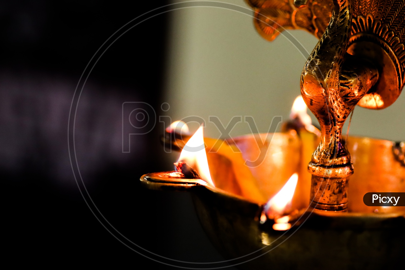 closeup view of oil brass lamp diya for holy worship puja