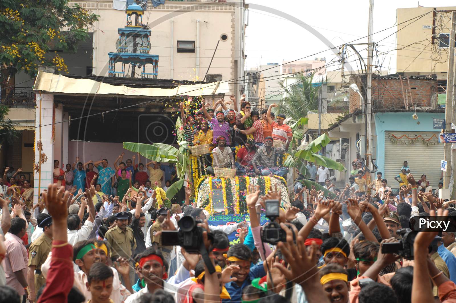 Crowd Of People Dancing and Celebrating in joy At a Road Rally in Movie Working Stills