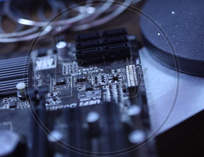 Macro Shot  of Computer Mother Board With Integrated Chips With Selective Focus