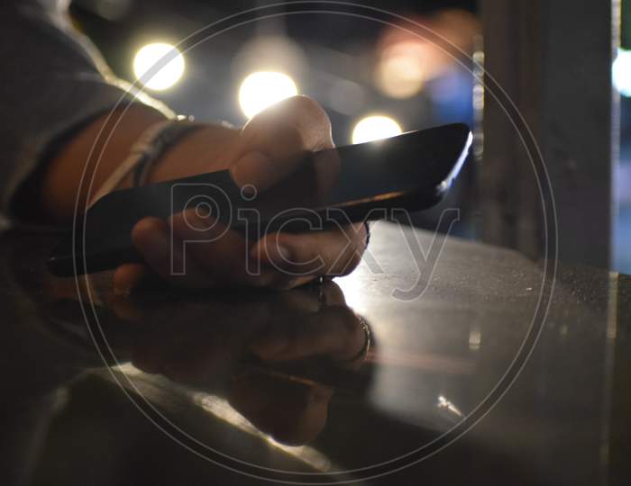 Woman Hand Holding a Smart Phone Closeup