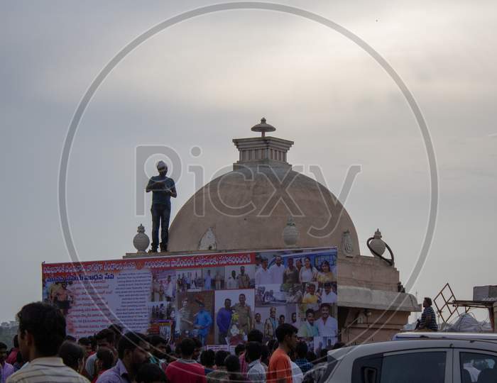 A Photographer Capturing Ganesh Vinayaka Idol Nimarjanam Immersion At Tank Bund Hyderabad, 12th September 2019