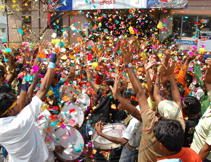 Crowd of People Celebrating a Movie Release At a Movie Theater by Dancing And Hailing in Movie Working Stills