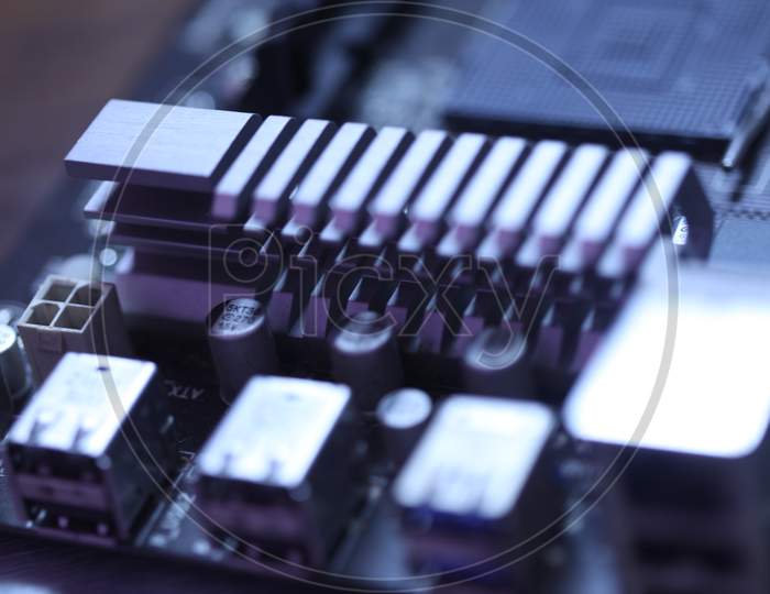 Macro Shot  of Computer Mother Board With Integrated Chips With Selective Focus
