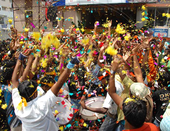 Crowd of People Celebrating a Movie Release At a Movie Theater by Dancing And Hailing in Movie Working Stills