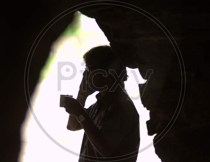Silhouette Of a Man Drinking Coffee